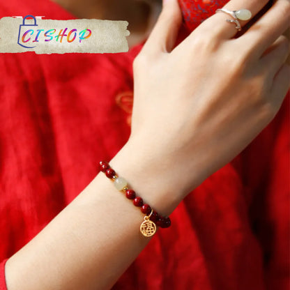 Bracelet porte-bonheur avec les pierres les plus chanceuses et de l'or violet naturel