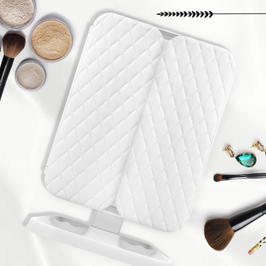 Miroir de maquillage pliable avec lumière de remplissage tactile.