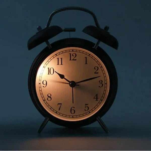 Réveil lumineux à quartz.