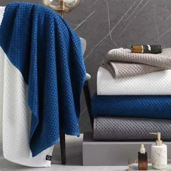 Pack exclusive de 5 serviettes de bain multi-usages.